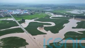Thousands of people evacuated as north-east China hit by more floods