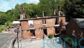 Remains of landmark pub demolished two days after it was gutted by fire