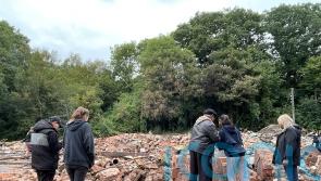 People gather at rubble of Crooked House to lament pub’s destruction