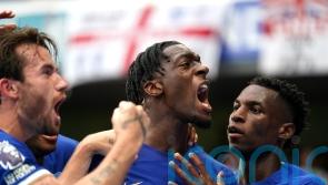 Chelsea and Liverpool share spoils in frantic opener