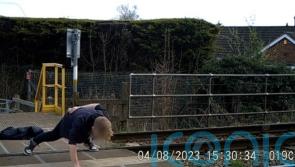 Safety warning after teenager seen doing one-armed press-up on level crossing