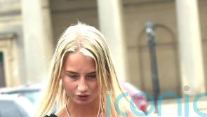 Woman who posed as man given community order for kissing female victim