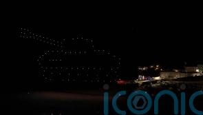 Drone display held over coastal town to highlight military training land risks