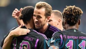Harry Kane scores on Bundesliga debut as champions Bayern open with big away win