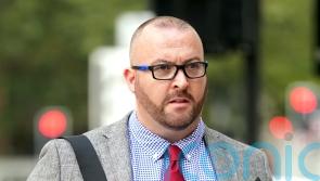 Police officer denies punching and choking teenage boy at London Tube station