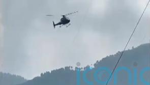 First two children rescued from cable car hundreds of feet above Pakistan canyon