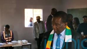 Polls open in Zimbabwe as president known as ‘the crocodile’ seeks second term