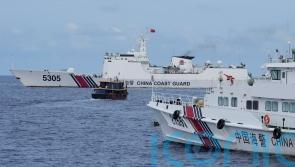 Philippine supply boats breach Chinese coast guard blockade in South China Sea
