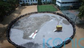 India prepares to land spacecraft on the Moon on second attempt in four years
