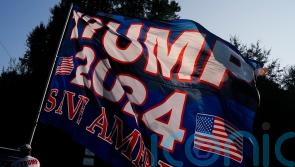 Trump supporters gather outside Georgia jail before his expected surrender
