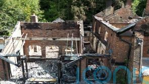 Two men arrested after fire at Crooked House pub released on police bail