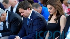 Florida governor Ron DeSantis booed at vigil as hundreds mourn racist killings