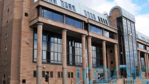 Two men in court charged with murder over suspected ammonia attack