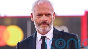 Martin McDonagh shows support for writers on first day of Venice Film Festival