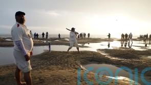 In Pictures: Waves stop play for Solent sandbar cricketers