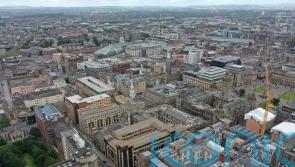 Two charged after police officer injured during incident