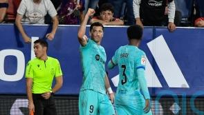 Barcelona snatch late win at Osasuna through Robert Lewandowski penalty