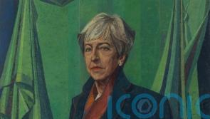 Picture of Tory PM May unveiled in Parliament