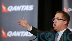Qantas boss quits after ticket-selling scandal