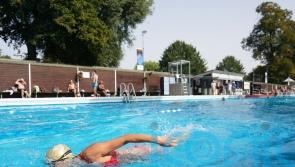 Swimmers enjoy sunshine and a dip at lido celebrating 100th anniversary