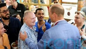 Prince of Wales kissed by Gazza during visit to Pret