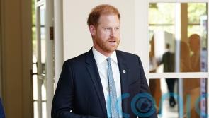 Harry all smiles on arrival at WellChild Awards