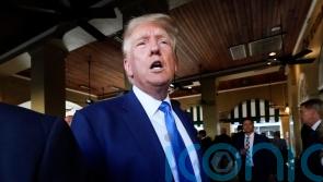 Prosecutor says ‘fairness’ behind decision to lump Trump in mass criminal trial