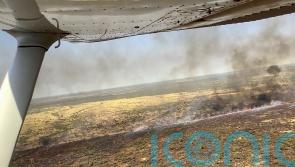 Australian authorities working to protect Outback town against huge wildfire
