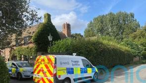Man held on suspicion of murder after woman, 65, shot dead