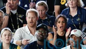 Meghan and Harry join crowds at Invictus Games after walking in holding hands