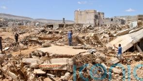 Libya buries thousands after deadly floods as search teams look for survivors