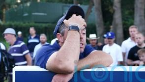 Rory McIlroy holds his nerve with birdie amid farcical scenes at Wentworth