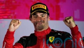 Carlos Sainz holds on for victory in Singapore as Red Bull’s winning run ends