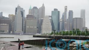 William wades into New York river to learn about oyster reef project
