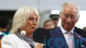 Queen takes on French president’s wife in game of table tennis