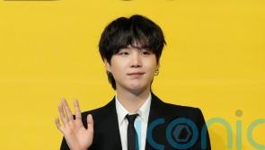Suga from BTS begins mandatory military duty in South Korea