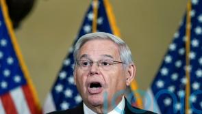 US senator faces bribery charges after gold bars and cash found hidden in home