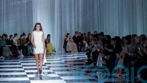 Kendall Jenner and Claudia Schiffer on the catwalk at Versace
