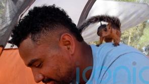 Venezuelan faces having to part with pet squirrel after making it to US border