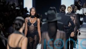 Naomi Campbell wears black lingerie on Dolce and Gabbana catwalk