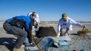 Nasa’s first asteroid samples land on Earth after release from spacecraft