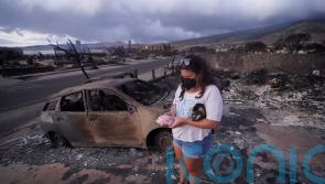 Lahaina residents begin returning to sites of homes destroyed by deadly wildfire