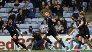 Late goal gives Darren Moore a draw in his first game as Huddersfield boss