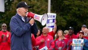 Biden visits car workers’ picket line in Michigan as strike continues