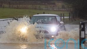Councils deluged with compensation claims for flash floods as road funding cut