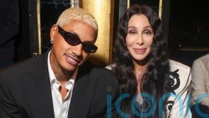See Cher and Kim Cattrall in power outfits for Balmain fashion show
