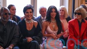 Kim Kardashian and Beckhams on front row as Victoria unveils latest collection