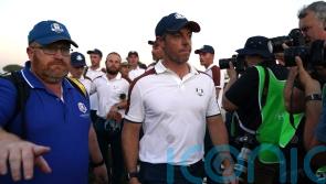 Rory McIlroy restrained by Shane Lowry after Ryder Cup argument with US caddie