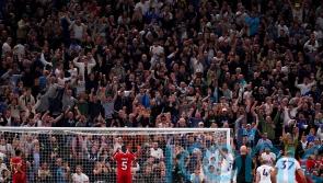 Tottenham claim dramatic last-gasp victory over nine-man Liverpool