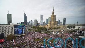 Opposition leader Donald Tusk says change ‘inevitable’ at Polish election rally